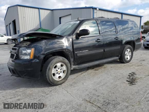 2009 Chevrolet Suburban 1LT z VIN 1GNFC26J69R253420, wystawiony jako Copart lot #78387524 z przebiegiem 189 009 mil mil oraz Szkoda całkowita • Salvage title. Historia ofert i sprzedaży dostępna na DreamBid. Obrazek 1.