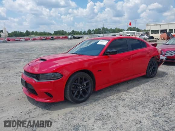 2023 Dodge Charger R/T with VIN 2C3CDXCT2PH535518, listed as a IAAI auction lot 43015774 with 34,003 mi miles and . Bid and sale history available at DreamBid. Image 2.