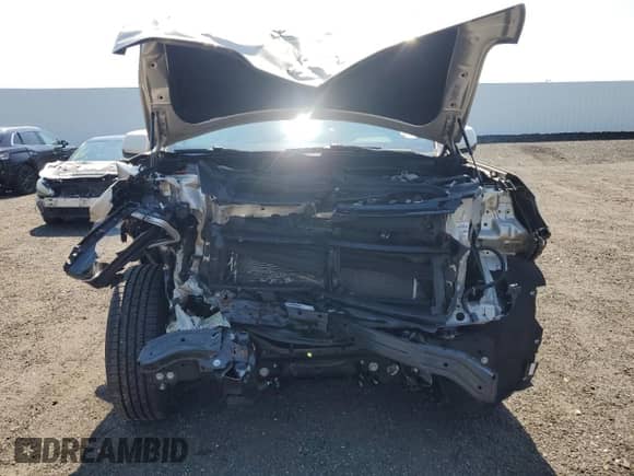 2022 Chevrolet Tahoe LT with VIN 1GNSKNKD3NR259656, listed as a Copart auction lot 62354725 with 67,169 mi miles and Salvage title. Bid and sale history available at DreamBid. Image 5.