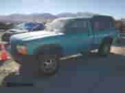 1996 Dodge Dakota z VIN 1B7GG26X9TW707044, wystawiony jako Copart lot #77101384 z przebiegiem 112 847 mil mil oraz Szkoda całkowita • Salvage title. Historia ofert i sprzedaży dostępna na DreamBid. Obrazek 1.