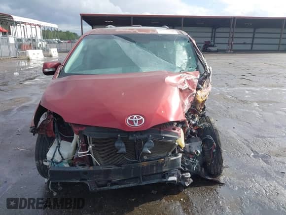 2013 Toyota Sienna XLE with VIN 5TDDK3DC0DS052412, listed as a IAAI auction lot 41850630 with Not provided miles and . Bid and sale history available at DreamBid. Image 12.