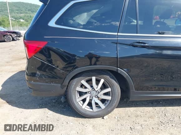 2020 Honda Pilot EX-L z VIN 5FNYF6H57LB033099, wystawiony jako IAAI lot #42588491 z przebiegiem 135 945 mil mil oraz . Historia ofert i sprzedaży dostępna na DreamBid. Obrazek 19.