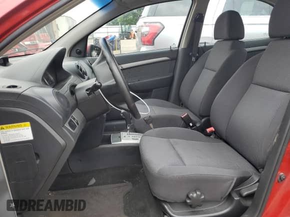 2009 Chevrolet Aveo 1LT with VIN KL1TD56E49B341296, listed as a Copart auction lot 57745645 with 44,589 mi miles and Salvage title. Bid and sale history available at DreamBid. Image 7.
