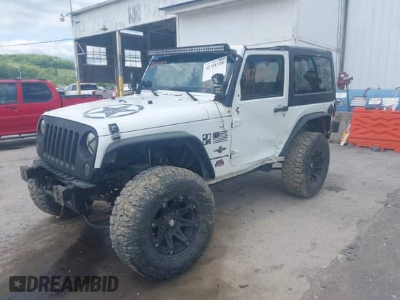 2012 Jeep Wrangler Sport с VIN 1C4AJWAG0CL289478, выставлен на аукционе IAAI как лот 41781118 с пробегом 127 299 миль миль и . История ставок и продаж доступна на DreamBid. Изображение 2.