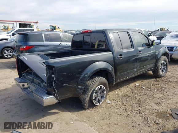 2019 Nissan Frontier SV with VIN 1N6AD0EV6KN771045, listed as a IAAI auction lot 41311008 with 129,071 mi miles and . Bid and sale history available at DreamBid. Image 4.