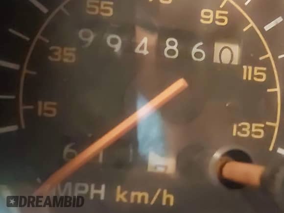 1989 Chevrolet Chevy Van z VIN 1GBEG25K1K7176240, wystawiony jako IAAI lot #42190073 z przebiegiem 99 486 mil mil oraz . Historia ofert i sprzedaży dostępna na DreamBid. Obrazek 7.