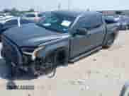 2025 Toyota Tundra SR with VIN 5TFLA5AB2SX048486, listed as a IAAI auction lot 43037169 with 4,902 mi miles and . Bid and sale history available at DreamBid. Image 2.