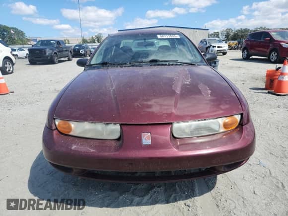 2002 Saturn SL with VIN 1G8ZG52882Z192053, listed as a Copart auction lot 68711695 with 309,633 mi miles and Salvage title. Bid and sale history available at DreamBid. Image 5.