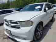 2013 Dodge Durango R/T with VIN 1C4SDHCT4DC658023, listed as a IAAI auction lot 43020765 with 252,063 mi miles and . Bid and sale history available at DreamBid. Image 2.