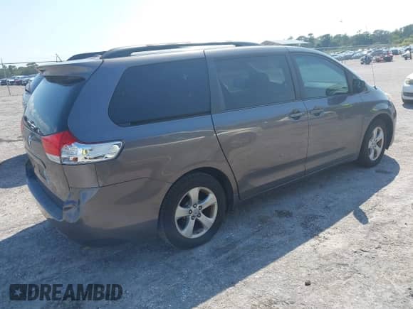 2012 Toyota Sienna LE with VIN 5TDKK3DC0CS272798, listed as a IAAI auction lot 43264548 with 173,246 mi miles and . Bid and sale history available at DreamBid. Image 4.