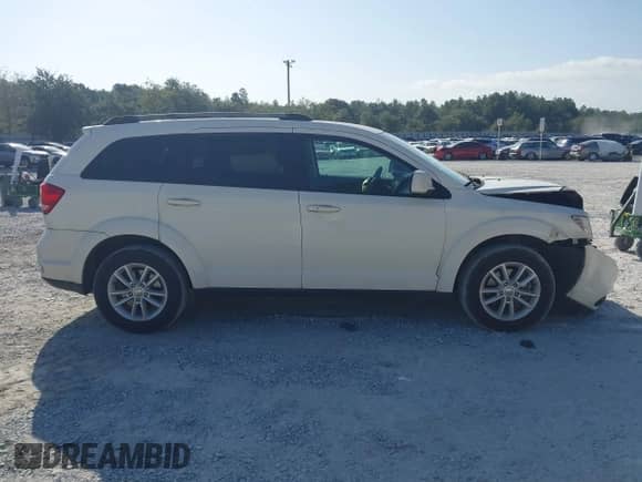 2017 Dodge Journey SXT z VIN 3C4PDCBG8HT589795, wystawiony jako IAAI lot #43359975 z przebiegiem 129 361 mil mil oraz . Historia ofert i sprzedaży dostępna na DreamBid. Obrazek 13.