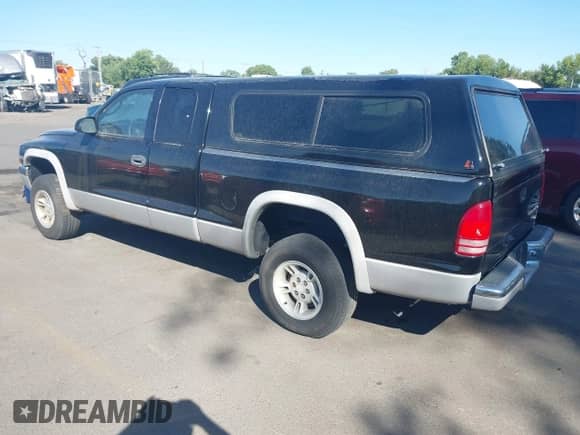 2000 Dodge Dakota Sport z VIN 1B7GG22N1YS757441, wystawiony jako IAAI lot #42717341 z przebiegiem 358 200 mil mil oraz . Historia ofert i sprzedaży dostępna na DreamBid. Obrazek 3.