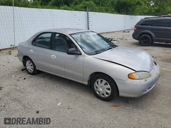 1997 Hyundai Elantra z VIN KMHJF24M9VU540731, wystawiony jako Copart lot #63684645 z przebiegiem Nie podano mil oraz Szkoda całkowita • Salvage title. Historia ofert i sprzedaży dostępna na DreamBid. Obrazek 4.