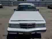 1989 Dodge Dynasty with VIN 1B3BC463XKD594439, listed as a Copart auction lot 65792195 with 61,970 mi miles and Clean title. Bid and sale history available at DreamBid. Image 5.