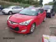 2012 Hyundai Veloster w/Gray Int z VIN KMHTC6AD1CU054540, wystawiony jako IAAI lot #43437087 z przebiegiem 173 534 mil mil oraz . Historia ofert i sprzedaży dostępna na DreamBid. Obrazek 2.