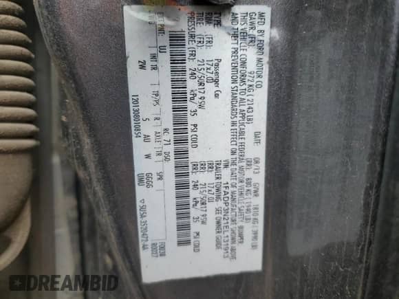 2014 Ford Focus Titanium z VIN 1FADP3N21EL131913, wystawiony jako Copart lot #70875285 z przebiegiem 117 786 mil mil oraz Szkoda całkowita • Salvage title. Historia ofert i sprzedaży dostępna na DreamBid. Obrazek 12.