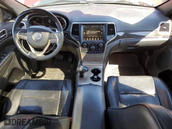 2015 Jeep Grand Cherokee High Altitude z VIN 1C4RJFCM3FC882486, wystawiony jako Copart lot #68382555 z przebiegiem 114 453 mil mil oraz Szkoda całkowita • Salvage title. Historia ofert i sprzedaży dostępna na DreamBid. Obrazek 8.