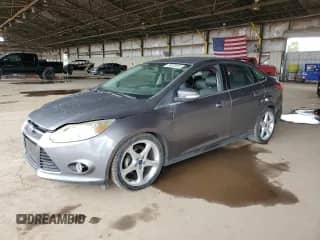 2014 Ford Focus Titanium with VIN 1FADP3J21EL300155, listed as a Copart auction lot 86535845 with 100,737 mi miles and Clean title. Bid and sale history available at DreamBid. Image 1.