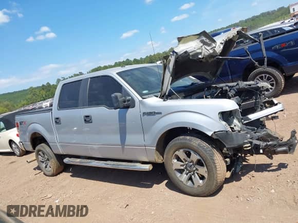 2014 Ford F-150 XLT z VIN 1FTFW1CF1EKF68283, wystawiony jako IAAI lot #43175606 z przebiegiem 174 721 mil mil oraz . Historia ofert i sprzedaży dostępna na DreamBid. Obrazek 13.