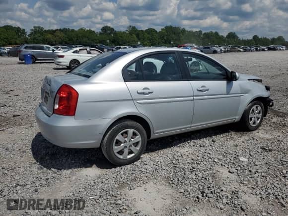 2010 Hyundai Accent GLS с VIN KMHCN4AC8AU416429, выставлен на аукционе Copart как лот 62007544 с пробегом 107 340 миль миль и Списание • Salvage title. История ставок и продаж доступна на DreamBid. Изображение 3.