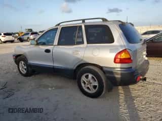 2001 Hyundai Santa Fe GLS z VIN KM8SC83DX1U090034, wystawiony jako Copart lot #79499434 z przebiegiem 170 605 mil mil oraz Czysty tytuł • Clean title. Historia ofert i sprzedaży dostępna na DreamBid. Obrazek 2.