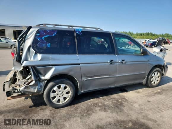 2002 Honda Odyssey LX with VIN 2HKRL18532H504584, listed as a Copart auction lot 67735975 with 230,708 mi miles and Salvage title. Bid and sale history available at DreamBid. Image 3.