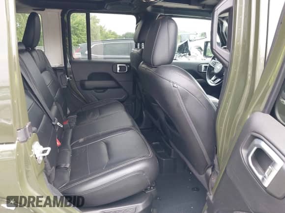 2022 Jeep Wrangler Unlimited Sahara with VIN 1C4JJXP67NW275731, listed as a IAAI auction lot 42992514 with 32,279 mi miles and . Bid and sale history available at DreamBid. Image 8.