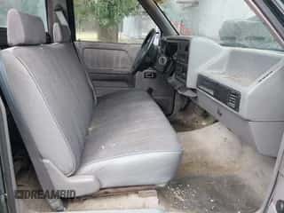 1995 Dodge Dakota SLT z VIN 1B7FL26X5SW942983, wystawiony jako IAAI lot #43511580 z przebiegiem 134 711 mil mil oraz . Historia ofert i sprzedaży dostępna na DreamBid. Obrazek 5.