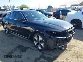 2023 BMW i4 eDrive35 с VIN WBY43AW00PFP59405, выставлен на аукционе IAAI как лот 42226691 с пробегом 31 748 миль миль и . История ставок и продаж доступна на DreamBid. Изображение 1.
