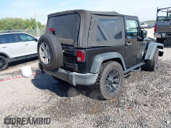 2016 Jeep Wrangler Sport with VIN 1C4AJWAGXGL183674, listed as a IAAI auction lot 43210942 with 95,383 mi miles and . Bid and sale history available at DreamBid. Image 4.