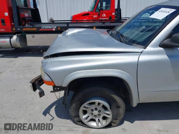 2001 Dodge Dakota Sport with VIN 1B7GG2ANX1S195515, listed as a IAAI auction lot 42691528 with 183,136 mi miles and . Bid and sale history available at DreamBid. Image 6.