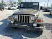 2004 Jeep Wrangler Sahara с VIN 1J4FA59S34P742442, выставлен на аукционе Copart как лот 51053095 с пробегом 161 263 миль миль и Списание • Salvage title. История ставок и продаж доступна на DreamBid. Изображение 10.