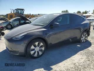2022 Tesla Model Y Long Range with VIN 7SAYGDEE6NF509399, listed as a Copart auction lot 71325645 with 25,108 mi miles and Salvage title. Bid and sale history available at DreamBid. Image 1.