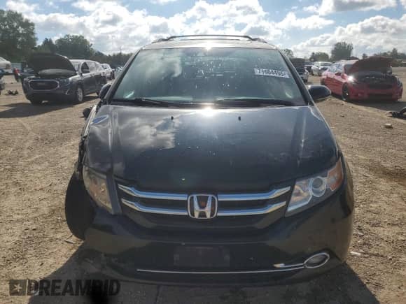 2015 Honda Odyssey Touring Elite z VIN 5FNRL5H95FB052149, wystawiony jako Copart lot #71604495 z przebiegiem 180 653 mil mil oraz Szkoda całkowita • Salvage title. Historia ofert i sprzedaży dostępna na DreamBid. Obrazek 5.