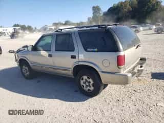2004 Chevrolet Blazer LS z VIN 1GNDT13X64K162188, wystawiony jako Copart lot #74063354 z przebiegiem Nie podano mil oraz Szkoda całkowita • Salvage title. Historia ofert i sprzedaży dostępna na DreamBid. Obrazek 2.