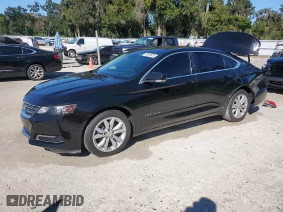 2018 Chevrolet Impala LT with VIN 1G1105S34JU114062, listed as a Copart auction lot 90459015 with 156,686 mi miles and Salvage title. Bid and sale history available at DreamBid. Image 1.