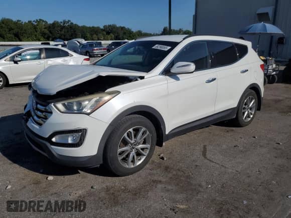 2014 Hyundai Santa Fe с VIN 5XYZU3LAXEG127728, выставлен на аукционе Copart как лот 69298855 с пробегом 98 371 миль миль и Списание • Salvage title. История ставок и продаж доступна на DreamBid. Изображение 1.