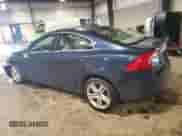2015 Volvo S60 T5 Drive-E Premier with VIN YV126MFK9F1354636, listed as a Copart auction lot 61228855 with 143,125 mi miles and Salvage title. Bid and sale history available at DreamBid. Image 2.