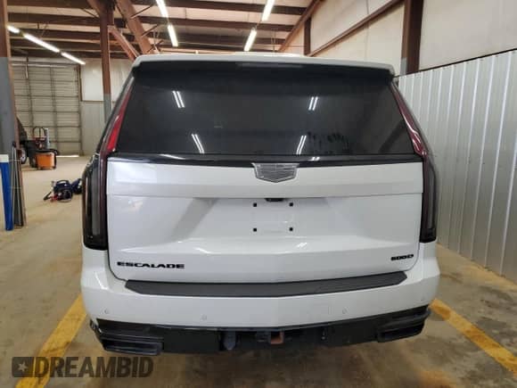 2021 Cadillac Escalade with VIN 1GYS4PKT3MR341742, listed as a Copart auction lot 61156165 with 77,916 mi miles and Salvage title. Bid and sale history available at DreamBid. Image 6.