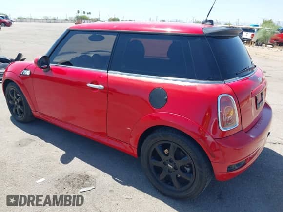 2010 MINI Hardtop with VIN WMWMF3C53ATZ64405, listed as a IAAI auction lot 42673213 with 135,765 mi miles and . Bid and sale history available at DreamBid. Image 3.