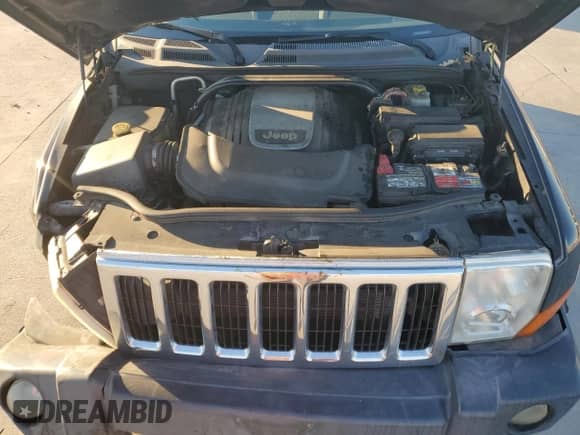 2007 Jeep Commander Limited z VIN 1J8HG58217C591460, wystawiony jako Copart lot #44587295 z przebiegiem 246 933 mil mil oraz Szkoda całkowita • Salvage title. Historia ofert i sprzedaży dostępna na DreamBid. Obrazek 12.