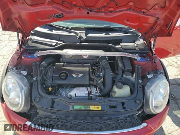 2011 MINI Hardtop S with VIN WMWSV3C50BTY12562, listed as a Copart auction lot 61183425 with 125,126 mi miles and Salvage title. Bid and sale history available at DreamBid. Image 11.