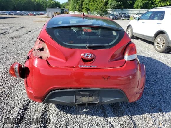 2013 Hyundai Veloster w/Black Int z VIN KMHTC6AD2DU126699, wystawiony jako Copart lot #57329805 z przebiegiem 85 303 mil mil oraz Szkoda całkowita • Salvage title. Historia ofert i sprzedaży dostępna na DreamBid. Obrazek 6.