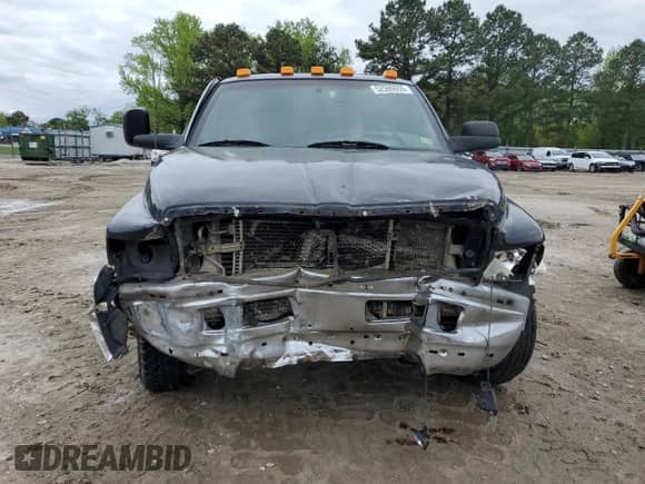 2002 Dodge 3500 с VIN 3B7MC33632M226950, выставлен на аукционе Copart как лот 52590655 с пробегом 207 240 миль миль и Списание • Salvage title. История ставок и продаж доступна на DreamBid. Изображение 5.