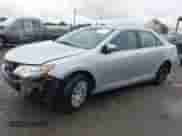 2014 Toyota Camry SE with VIN 4T1BF1FK6EU339105, listed as a IAAI auction lot 43353700 with 123,732 mi miles and . Bid and sale history available at DreamBid. Image 2.