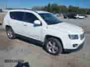 2015 Jeep Compass High Altitude with VIN 1C4NJCEA8FD210935, listed as a IAAI auction lot 43526780 with 195,054 mi miles and . Bid and sale history available at DreamBid. Image 1.