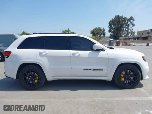 2018 Jeep Grand Cherokee Trackhawk with VIN 1C4RJFN97JC199045, listed as a IAAI auction lot 42169426 with 17,140 mi miles and . Bid and sale history available at DreamBid. Image 13.
