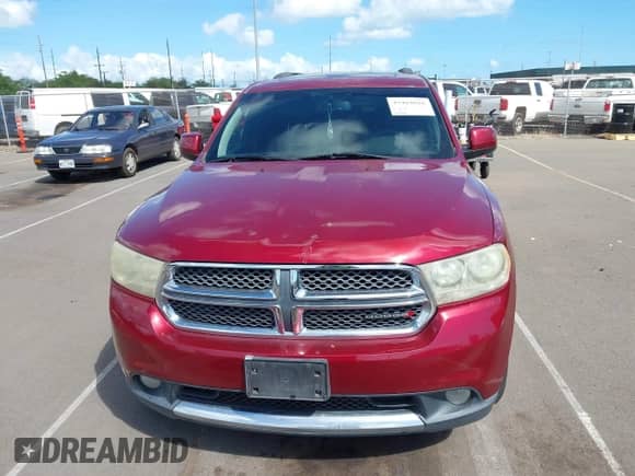 2013 Dodge Durango SXT with VIN 1C4RDHAG7DC685771, listed as a IAAI auction lot 43464816 with 149,141 mi miles and . Bid and sale history available at DreamBid. Image 12.