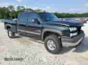2006 Chevrolet Silverado 2500HD Work Truck with VIN 1GCHC23216F119426, listed as a Copart auction lot 59610945 with 219,581 mi miles and Salvage title. Bid and sale history available at DreamBid. Image 4.