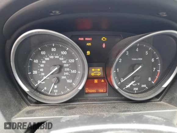 2012 BMW Z4 sDrive28i with VIN WBALL5C57CE716617, listed as a Copart auction lot 61099305 with 76,995 mi miles and Salvage title. Bid and sale history available at DreamBid. Image 9.